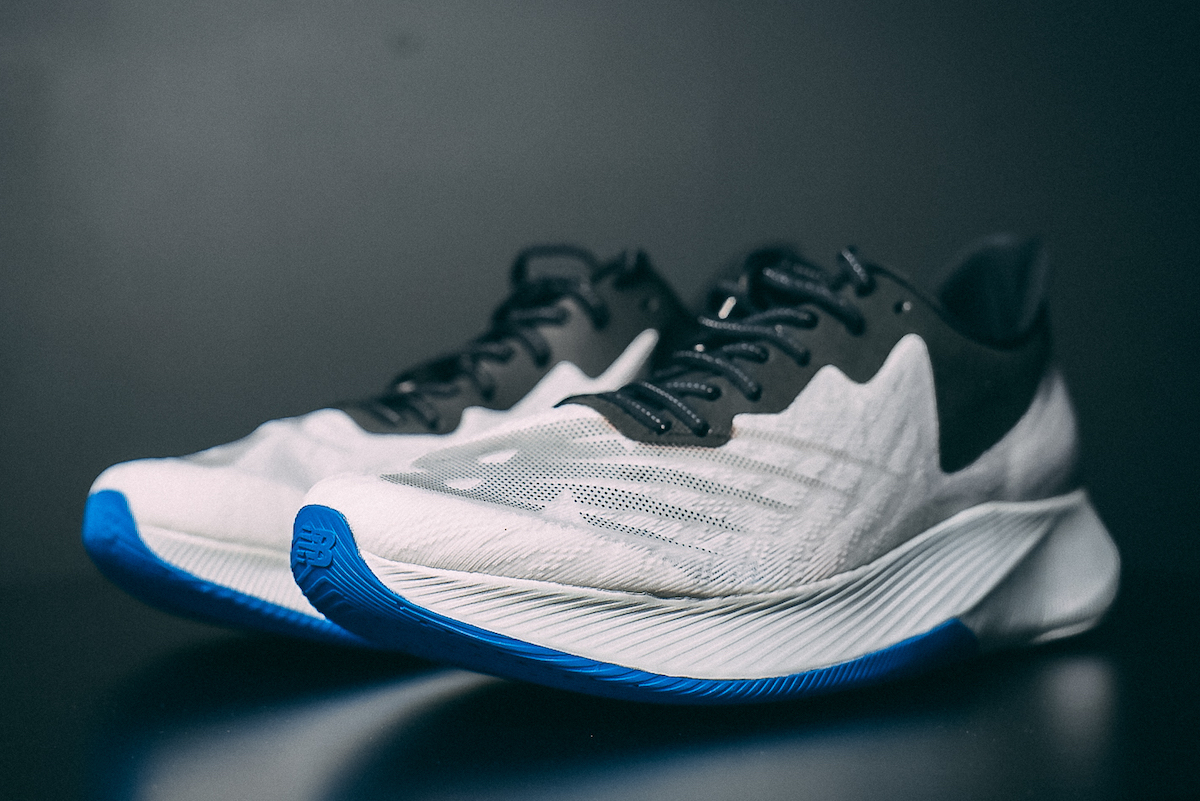 new balance fuelcell tc vs nike zoom fly 3